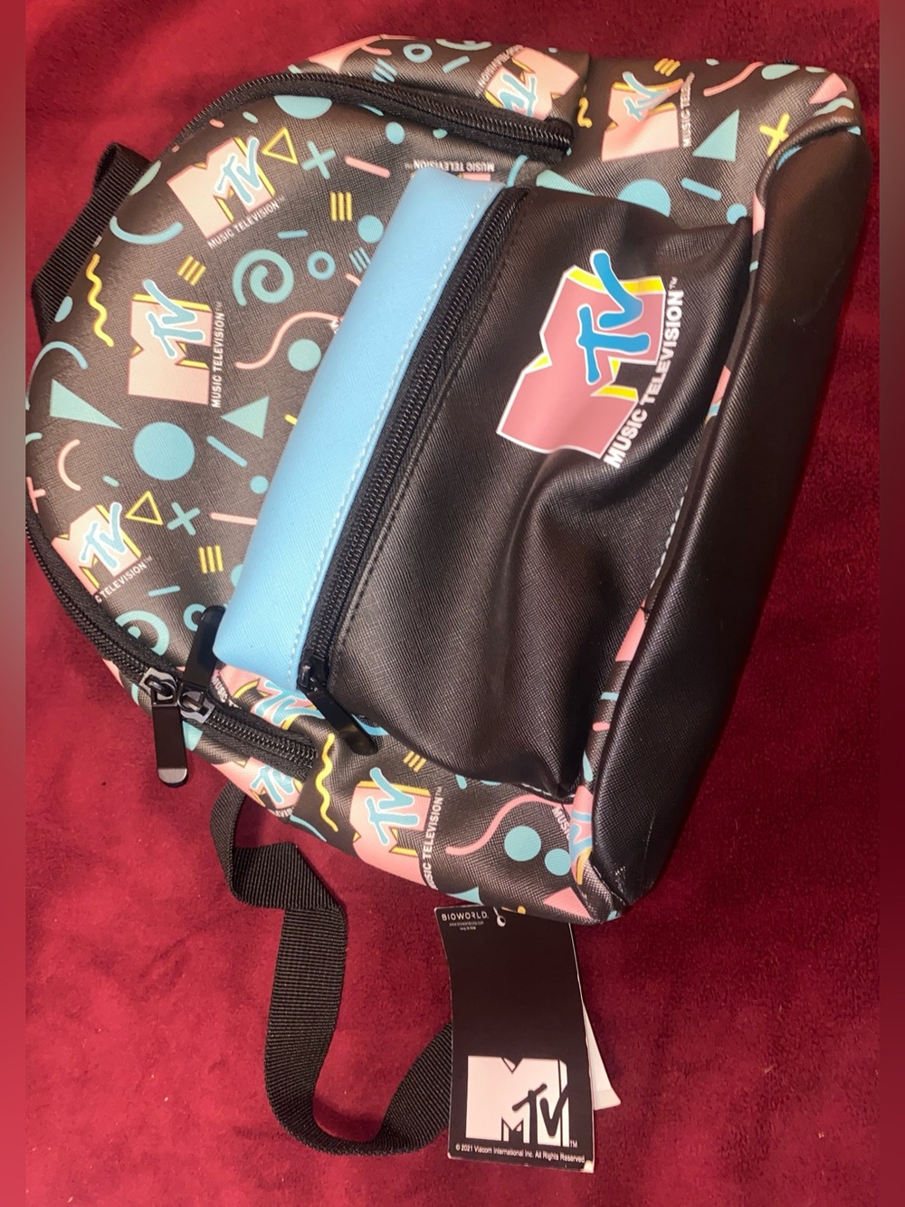 MTV Black Backpack with Teal Accent and Multicolor Pattern